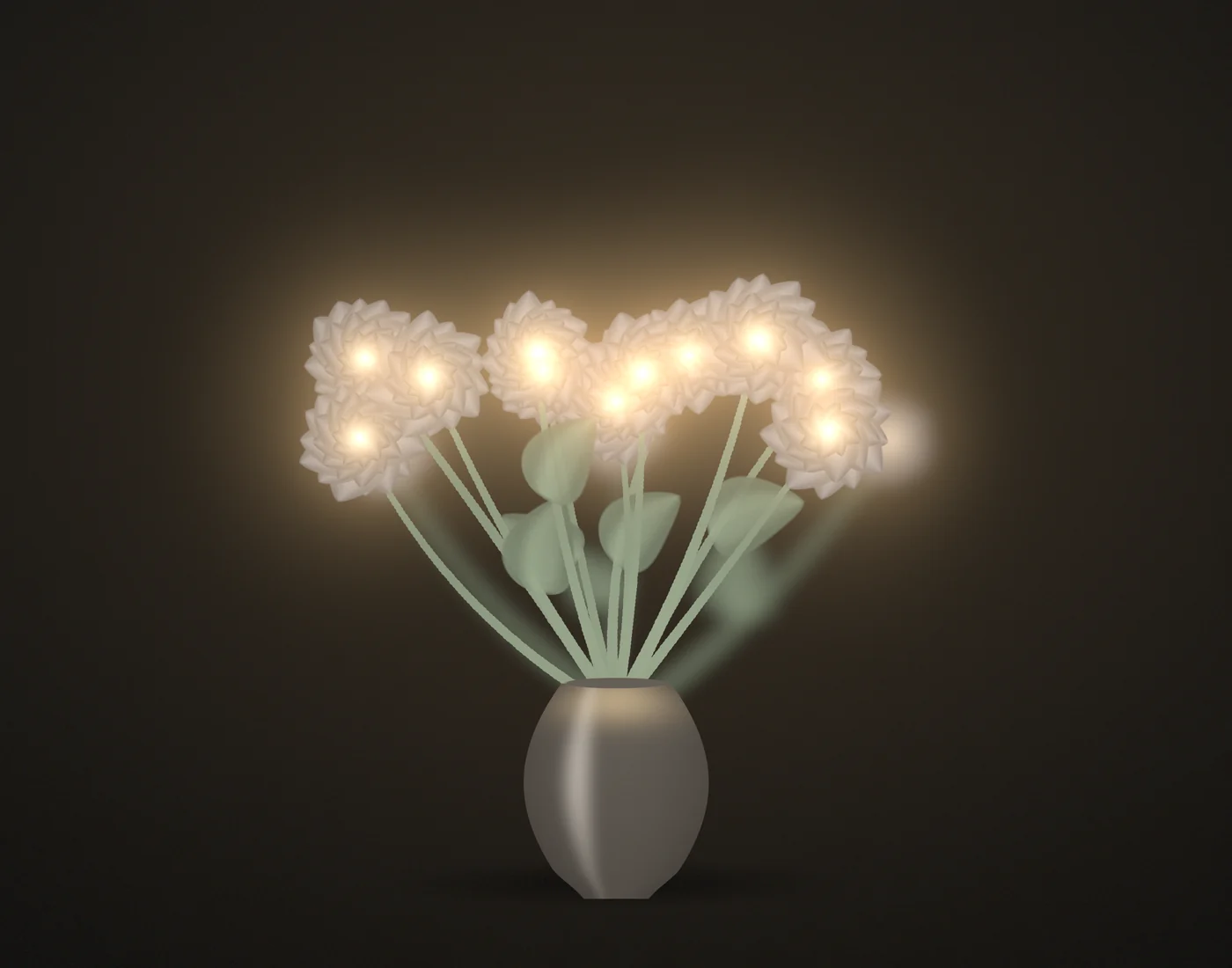 The same faux floral arrangement glowing with warm ambient light at night